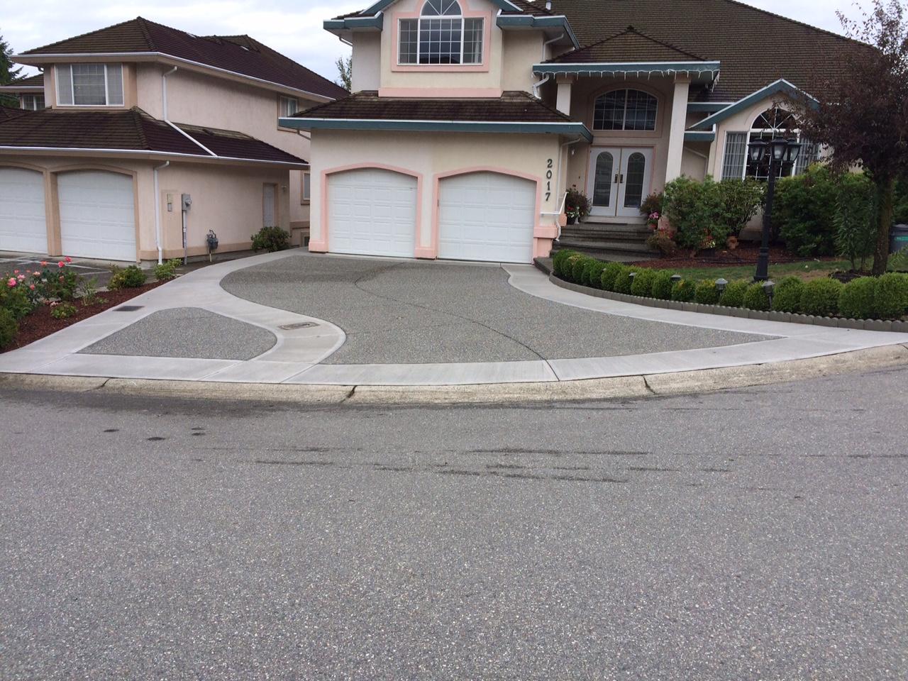 Exposed Concrete Driveway Expansion - After Tree Removal