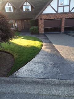 Stamped concrete and aggregate driveway