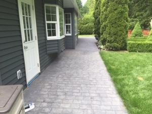 Cobble stamped concrete sidewalk