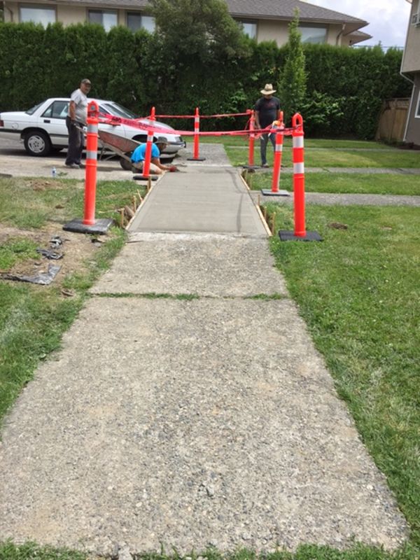 Before and after concrete sidewalk repair