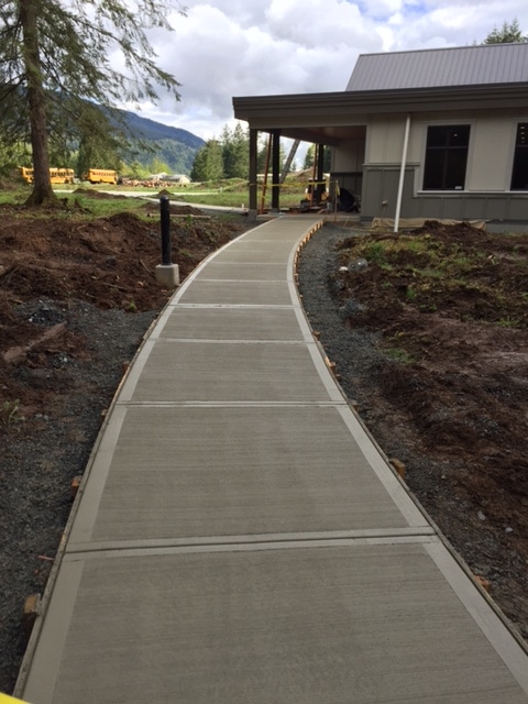 Curved concrete sidewalk at Stillwood Camp